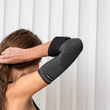 Cargar imagen en el visor de la galería, Elbow Compression Sleeve - ComfortWear
